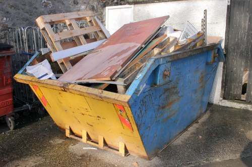 Clearance team removing old sofa